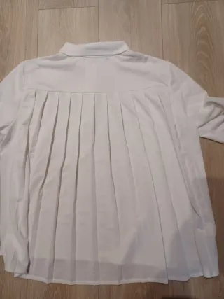 Polo Lacoste Blanco Plisado