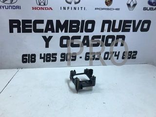 Soporte faro renault express izquierdo