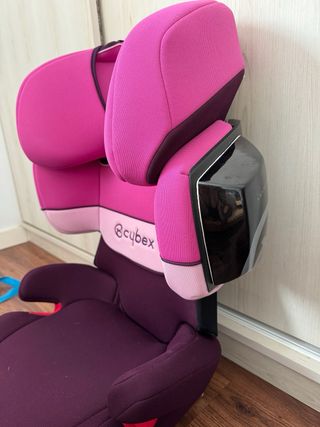 Sillita de coche Cybex rosa y morada