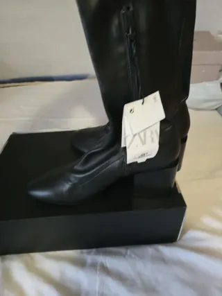 Stivali alti neri con tacco