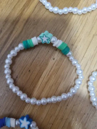 Pulseras perlas y abalorios estrella