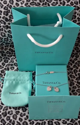 Colgante de plata doble corazón