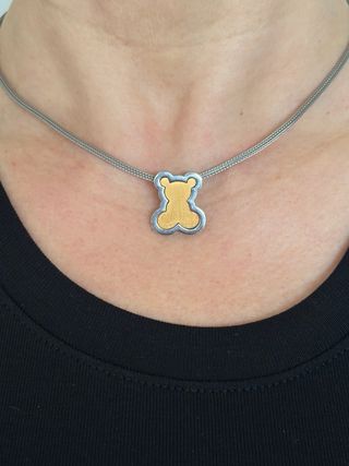 Gargantilla osito dorado y plateado