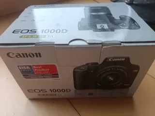 CAJA Canon EOS 1000D Manuales y CDs.