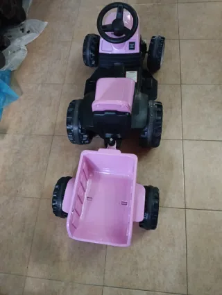 Trattore a batteria rosa con caricatore