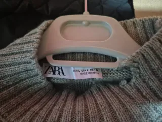 Jersey oversize gris con pedrería