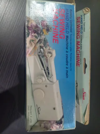 Máquina de coser portátil.
