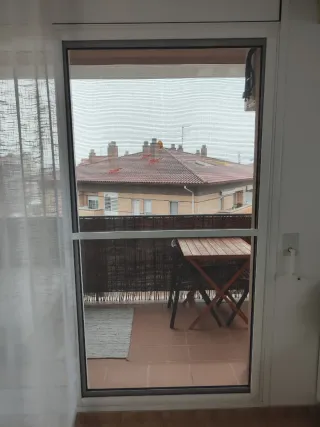 Mosquitera corredera para ventanal