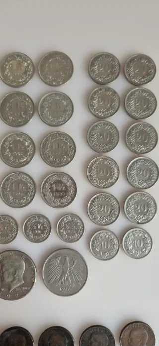 Lotto di franchi svizzeri e altre monete