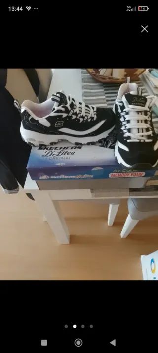 Zapatillas Skechers D'Lites Negras y Blancas