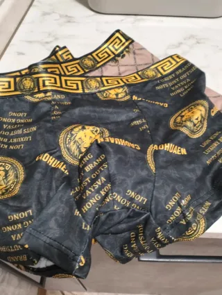 Intimo uomo CAOHUAEN nero e oro