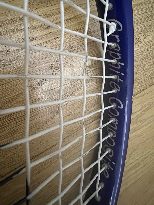 Raqueta de tenis/squash roja y azul Explosion