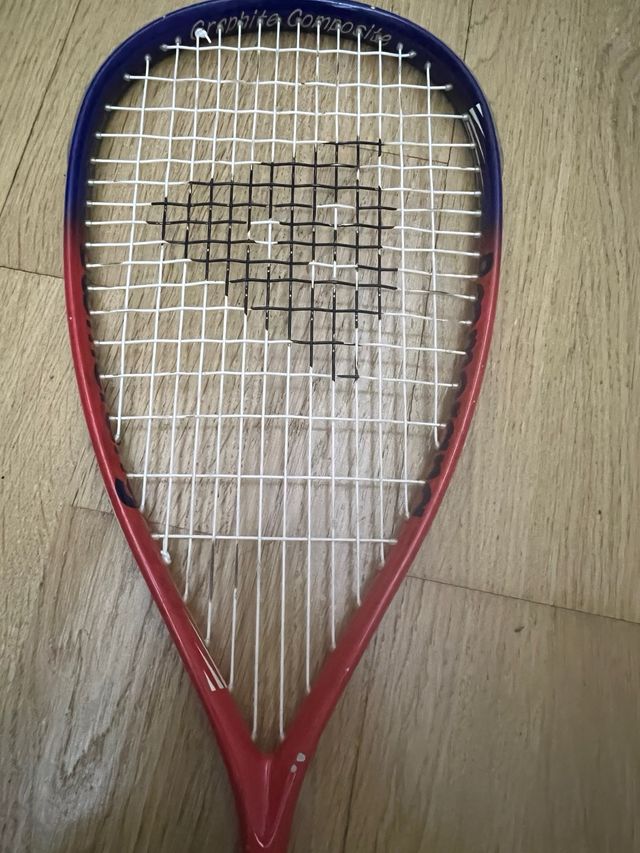 Raqueta de tenis/squash roja y azul Explosion