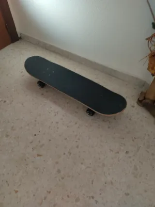 Monopatín Oxelo MID 500