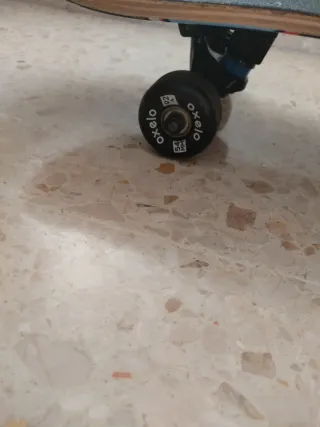 Monopatín Oxelo MID 500