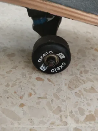 Monopatín Oxelo MID 500