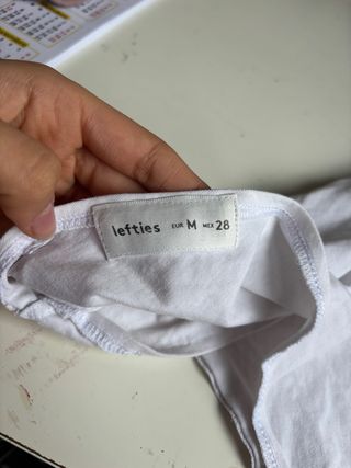 Top asimétrico blanco