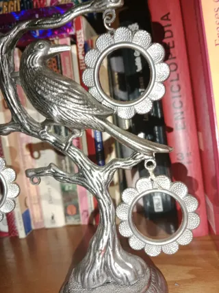 Portafotos pájaro metal