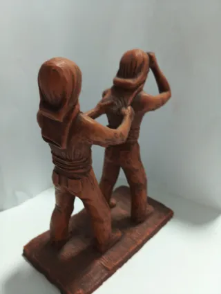 Figuras costaleros barro