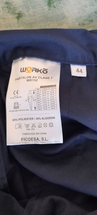 Pantalón de trabajo azul con detalles fluorescente