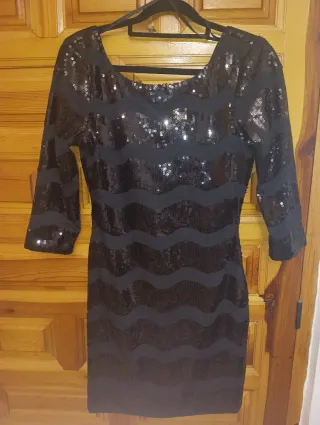 Vestido lentejuelas negro manga 3/4