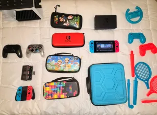 Nintendo Switch Completa con 4 mandos y accesorios