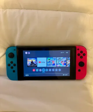 Nintendo Switch Completa con 4 mandos y accesorios