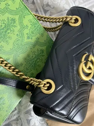 Bolso Gucci Negro y Dorado