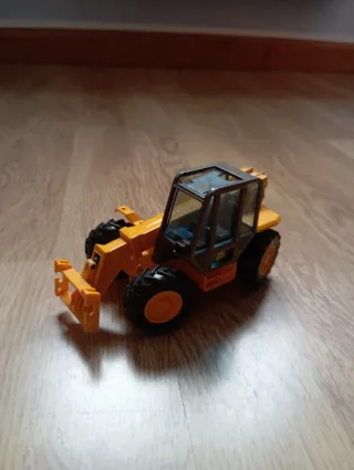 Escavadora de juguete amarilla JCB