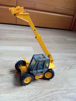 Escavadora de juguete amarilla JCB