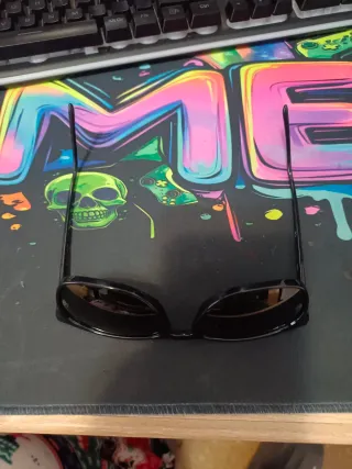 Gafas de sol Ray-Ban negras y marrones