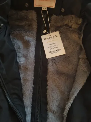 Abrigo porteo Wombat & Co. negro