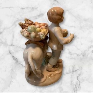 Figura vintage niño con burro y cesta