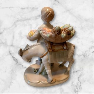 Figura vintage niño con burro y cesta