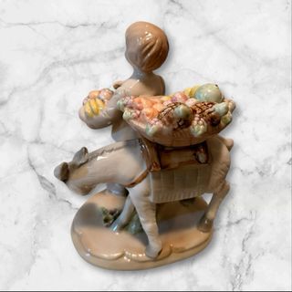 Figura vintage niño con burro y cesta