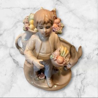 Figura vintage niño con burro y cesta