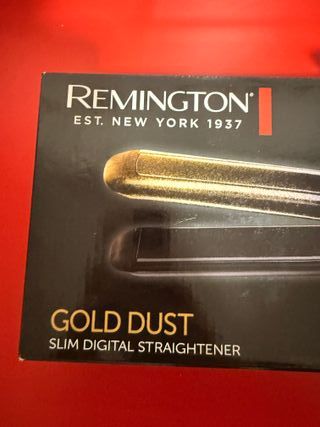 Plancha de pelo Remington negra y dorada