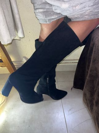 Botas altas negras elegantes