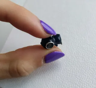 Charm pingüino con corazón azul