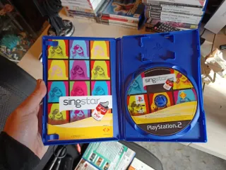 Lote 5 Juegos SingStar + Micrófonos PS2