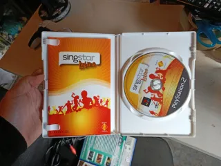 Lote 5 Juegos SingStar + Micrófonos PS2