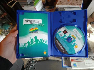 Lote 5 Juegos SingStar + Micrófonos PS2