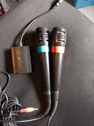 Lote 5 Juegos SingStar + Micrófonos PS2