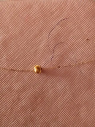 Cadena de oro con colgante