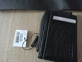 Cartera de piel negra con cremallera nueva