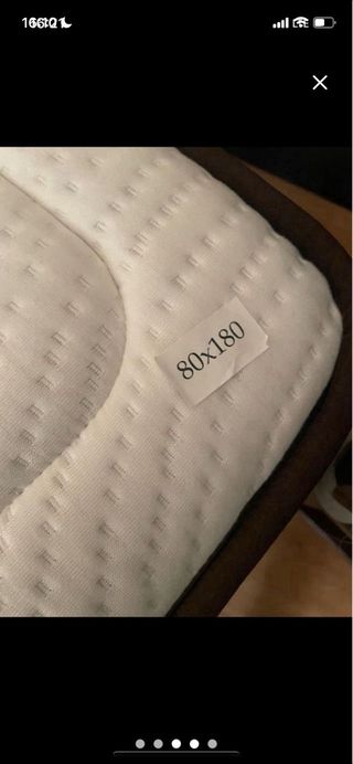 Colchón y somier con lamas de madera . sin uso