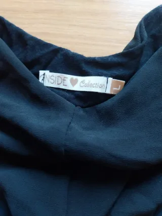 Blusa negra con detalle dorado