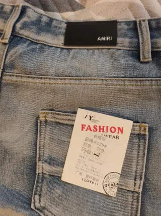 Pantalones vaqueros desgastados con parches amiri