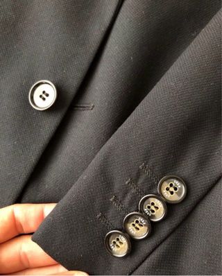 Traje slim fit negro con relieve