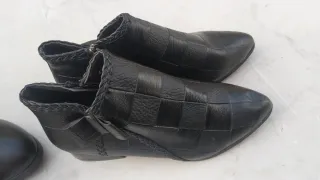 Botines negros de piel trenzada